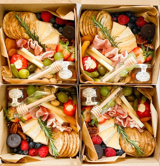 Individual charcuterie boxes and cups